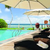 Sunbed by the Infinity pool
